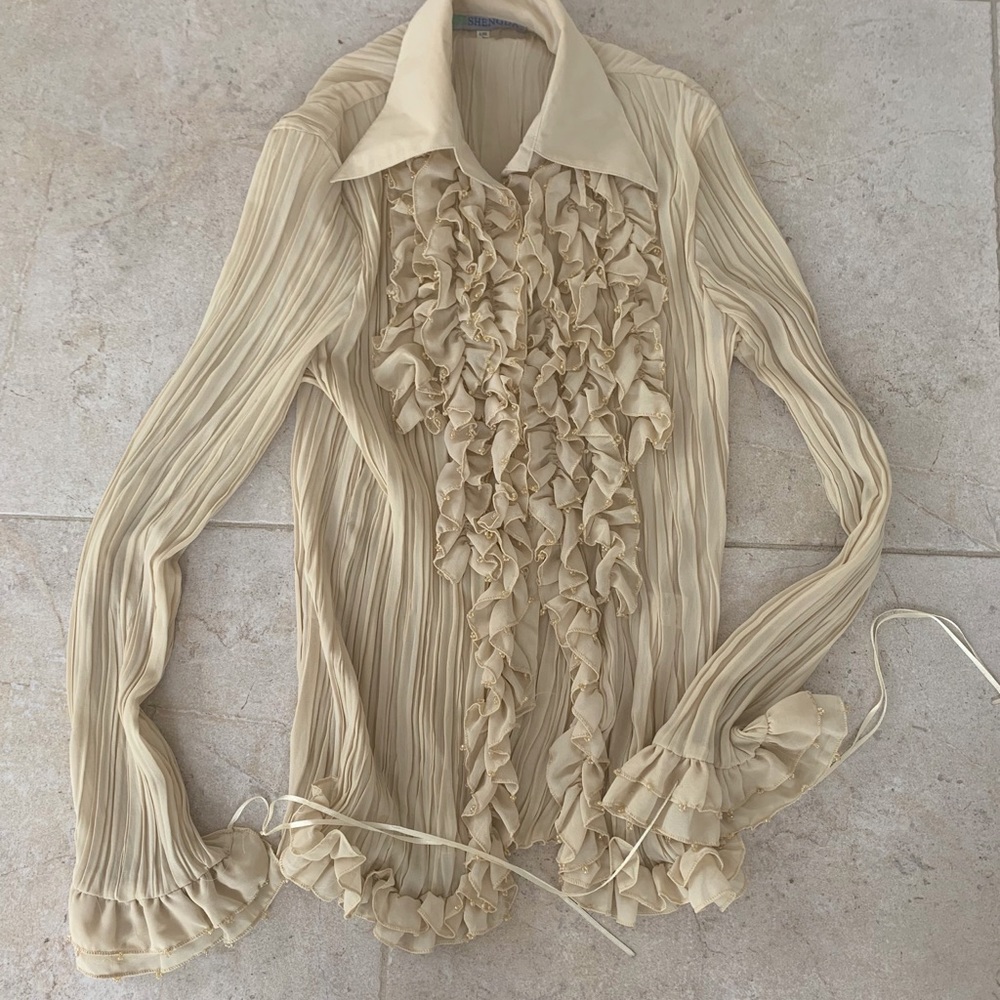 Ruffed tan colored blouse